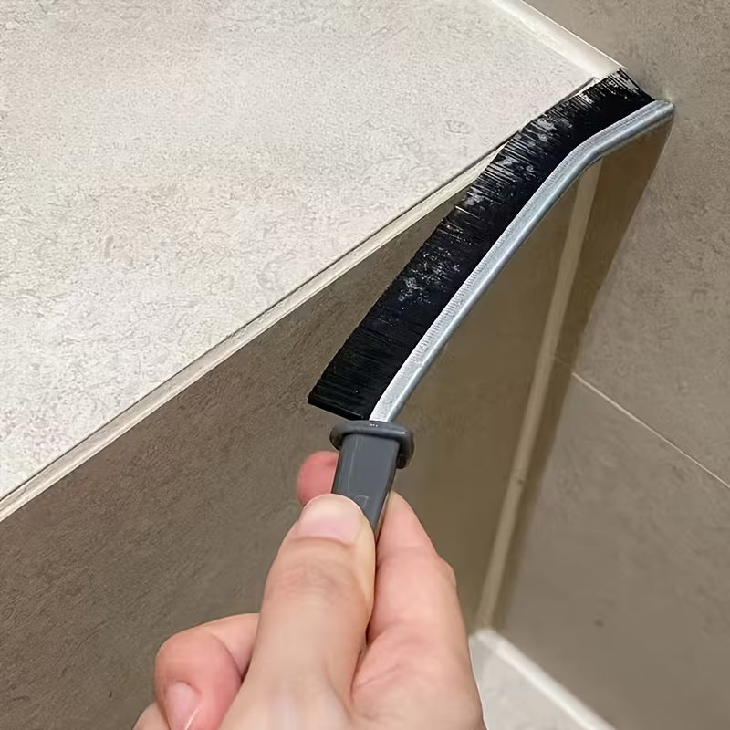 GlideClean stored upright on a kitchen counter – compact cleaning accessory