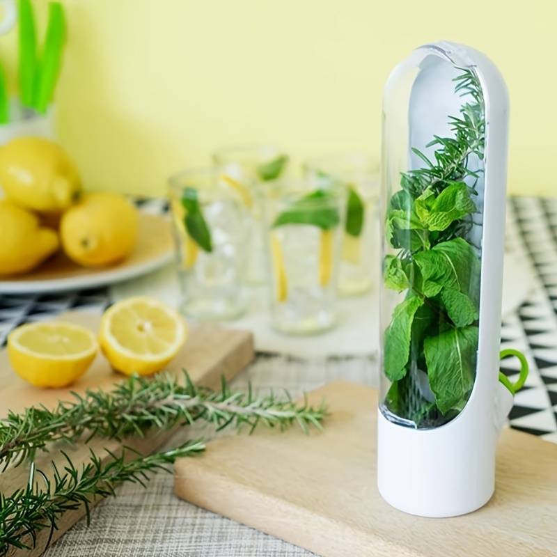 Three herb keeper jars lined up showing different fresh herbs – fridge-friendly