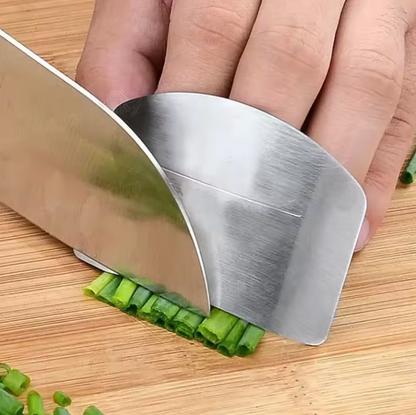 SafeSlice in use guiding a knife while cutting cucumber – chef finger protector