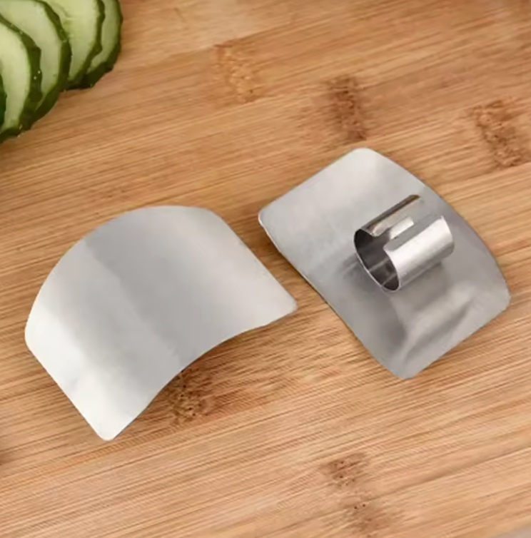 Finger guard close-up showing stainless steel slots – kitchen safety slicing tool
