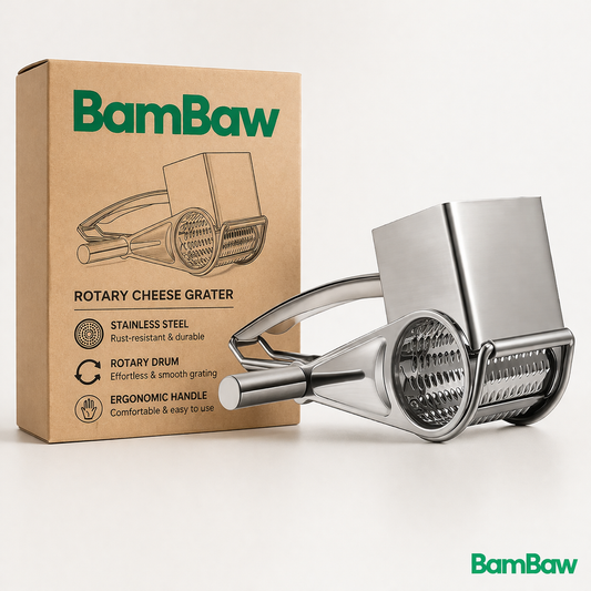 Stainless steel rotary cheese grater with hand crank grating Parmesan on a board